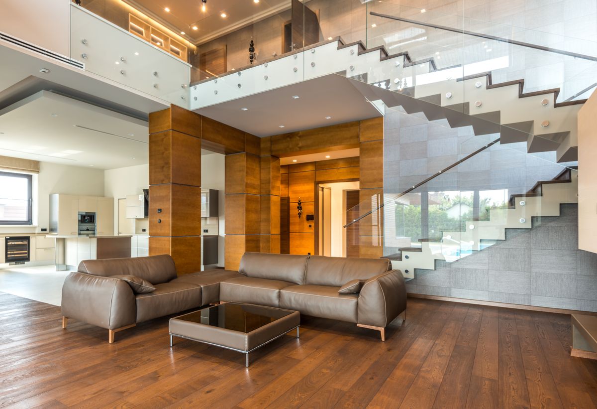 Double-height living room with modern furnishings